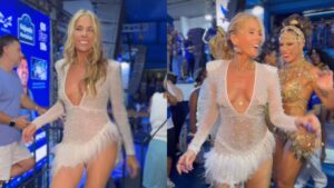 Adriane Galisteu samba com look transparente em ensaio da Portela