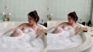 Luma de Oliveira posa à vontade durante banho de espuma