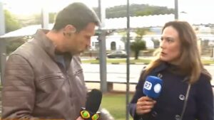 Repórter da Record é empurrada por jornalista da Band ao vivo